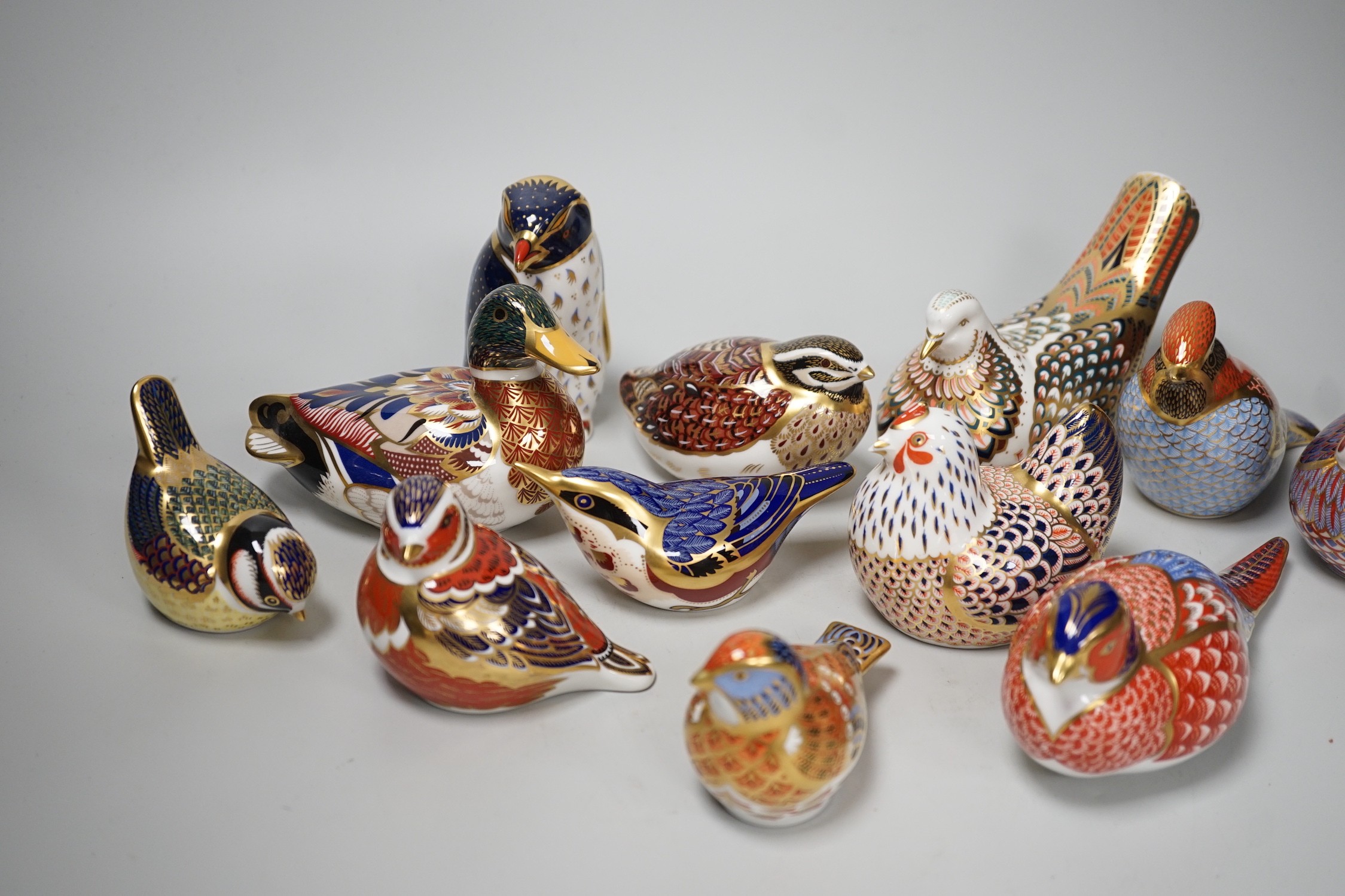 Twelve Royal Crown Derby ‘bird’ paperweights